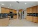 Bright kitchen with stainless steel appliances, ample cabinetry, and tile floors at 1287 Dove Tree Ct, Henderson, NV 89014