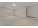 Bright living room with neutral carpet, recessed lighting, and large window allowing for natural light at 1287 Dove Tree Ct, Henderson, NV 89014