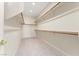 Walk-in closet providing organized storage solutions with shelving and ample space at 1287 Dove Tree Ct, Henderson, NV 89014
