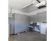 Organized garage interior with ample storage cabinets and a functional workspace at 1454 Erskine Ave, Las Vegas, NV 89123