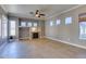 Bright living room features tile flooring, fireplace, and natural lighting at 1454 Erskine Ave, Las Vegas, NV 89123