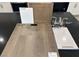 Interior design sample featuring luxury vinyl plank flooring, quartz countertop, and alabaster paint at 148 Silver Run Lane, Las Vegas, NV 89138