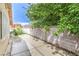Fenced backyard with concrete patio at 1574 Teardrop St, Las Vegas, NV 89142