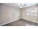 Bright bedroom with wood-look flooring and neutral paint at 1574 Teardrop St, Las Vegas, NV 89142