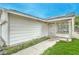Side view of a single-story home featuring solar panels and a walkway at 1574 Teardrop St, Las Vegas, NV 89142