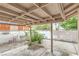 Covered patio with block wall and concrete floor at 1574 Teardrop St, Las Vegas, NV 89142