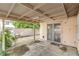 Covered patio with block wall and security door at 1574 Teardrop St, Las Vegas, NV 89142