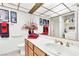 Bathroom vanity with adjacent shower and laundry featuring convenient amenities for residents at 1751 E Reno Ave # 206, Las Vegas, NV 89119
