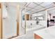 Bright bathroom featuring a glass shower and a soaking tub next to a vanity and mirror at 1751 E Reno Ave # 206, Las Vegas, NV 89119