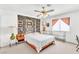 Bedroom with unique design features, a ceiling fan, and natural light at 1751 E Reno Ave # 206, Las Vegas, NV 89119