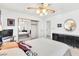 Bright bedroom features a ceiling fan and mirrored closet for added space and light at 1751 E Reno Ave # 206, Las Vegas, NV 89119