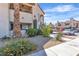 Image shows a clean condo exterior with an unobstructed view of the parking area and beautiful desert landscaping at 1751 E Reno Ave # 206, Las Vegas, NV 89119