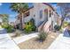Charming two-story condo with desert landscaping, front patios, and visible unit numbers at 1751 E Reno Ave # 206, Las Vegas, NV 89119