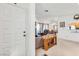 Inviting living room with cozy furniture, and a view of the dining area and fireplace at 1751 E Reno Ave # 206, Las Vegas, NV 89119