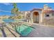 Community pool area with relaxing jacuzzi, lounge chairs and nearby shower at 1851 Hillpointe Rd # 2124, Henderson, NV 89074