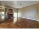 Spacious living room boasts hardwood floors, a fireplace, and ample natural light at 1851 Hillpointe Rd # 2124, Henderson, NV 89074