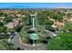Breathtaking aerial view of lush landscaping with a water fountain adding to the luxury of the estate at 2325 Prometheus Ct, Henderson, NV 89074