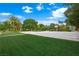 Well-maintained community basketball court with lush green surroundings, providing a recreational space for residents at 2325 Prometheus Ct, Henderson, NV 89074