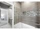 Modern shower room with elegant tilework and glass partition at 2325 Prometheus Ct, Henderson, NV 89074
