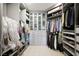 Spacious walk-in closet featuring ample storage with shelving and hanging racks for clothes and shoes at 2325 Prometheus Ct, Henderson, NV 89074
