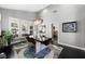 Bright dining room featuring stylish light fixture, modern furniture, and an open layout at 2325 Prometheus Ct, Henderson, NV 89074