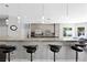Kitchen island with barstool seating, pendant lighting, and modern finishes at 2325 Prometheus Ct, Henderson, NV 89074
