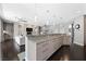 Bright and open kitchen area with granite countertop and dark flooring at 2325 Prometheus Ct, Henderson, NV 89074