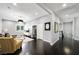 Open-concept living area with modern decor, natural light, and seamless flow to other areas at 2325 Prometheus Ct, Henderson, NV 89074