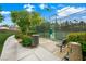 Community tennis court surrounded by lush greenery, offering a perfect spot for recreation and exercise at 2325 Prometheus Ct, Henderson, NV 89074