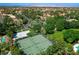 Aerial view of the tennis court with basketball area and a luxury pool for recreation and relaxation at 2325 Prometheus Ct, Henderson, NV 89074