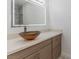 Stylish bathroom vanity featuring a vessel sink, modern faucet, and illuminated mirror at 2588 Mizzoni Cir, Henderson, NV 89052