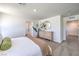 Spacious primary bedroom features neutral colors and an ensuite bathroom at 2641 Begonia Falls Ave # 88, North Las Vegas, NV 89081