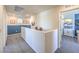 Second story landing includes decorative wall hangings and leads to an upstairs bedroom at 2641 Begonia Falls Ave # 88, North Las Vegas, NV 89081