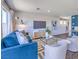 Well-decorated living room with a contemporary sofa, patterned chairs, and modern decor at 2641 Begonia Falls Ave # 88, North Las Vegas, NV 89081