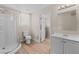 Bathroom featuring a glass shower, updated vanity, modern fixtures and a connecting room at 2712 Holmes St, North Las Vegas, NV 89030