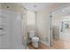 This bathroom features a tiled shower with a glass door and a modern toilet at 2712 Holmes St, North Las Vegas, NV 89030