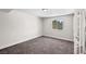 Bonus room featuring carpeted floors, natural lighting, and neutral walls at 2712 Holmes St, North Las Vegas, NV 89030
