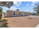 Charming single-story home with desert landscaping, complemented by a well-maintained lawn and inviting facade at 2712 Holmes St, North Las Vegas, NV 89030
