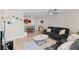Spacious living room with a dining area, modern decor, and plenty of seating at 2712 Holmes St, North Las Vegas, NV 89030