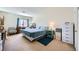 Comfortable bedroom with carpet, natural light, and neutral decor at 2902 Aztec Lily Ln, Henderson, NV 89074