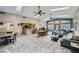 A spacious clubhouse with an open kitchen, dining area and comfortable seating at 2902 Aztec Lily Ln, Henderson, NV 89074
