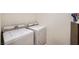 A dedicated laundry area featuring a washer and dryer at 2902 Aztec Lily Ln, Henderson, NV 89074