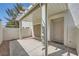 Charming covered patio with access to the home's front door at 2902 Aztec Lily Ln, Henderson, NV 89074