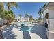 Resort-style community pool with a separate jacuzzi and well-maintained landscaping at 2902 Aztec Lily Ln, Henderson, NV 89074