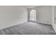 A bright bedroom with a large window providing ample natural light at 3150 Soft Breezes Dr # 2046, Las Vegas, NV 89128