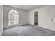 Bedroom featuring a large window and a closet with an open door at 3150 Soft Breezes Dr # 2046, Las Vegas, NV 89128