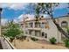 Exterior view of the building, displaying classic architectural elements and manicured landscaping, providing a welcoming appeal at 3150 Soft Breezes Dr # 2046, Las Vegas, NV 89128