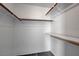 Well-organized closet with multiple shelves and rods for ample storage at 3150 Soft Breezes Dr # 2046, Las Vegas, NV 89128