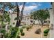 Scenic view from balcony overlooking beautifully landscaped grounds, showcasing community's charm and tranquility at 3150 Soft Breezes Dr # 2046, Las Vegas, NV 89128