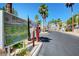 Image of Mar-a-Lago Community map and entry, showcasing the building's layout, palm trees, and controlled access at 3150 Soft Breezes Dr # 2046, Las Vegas, NV 89128